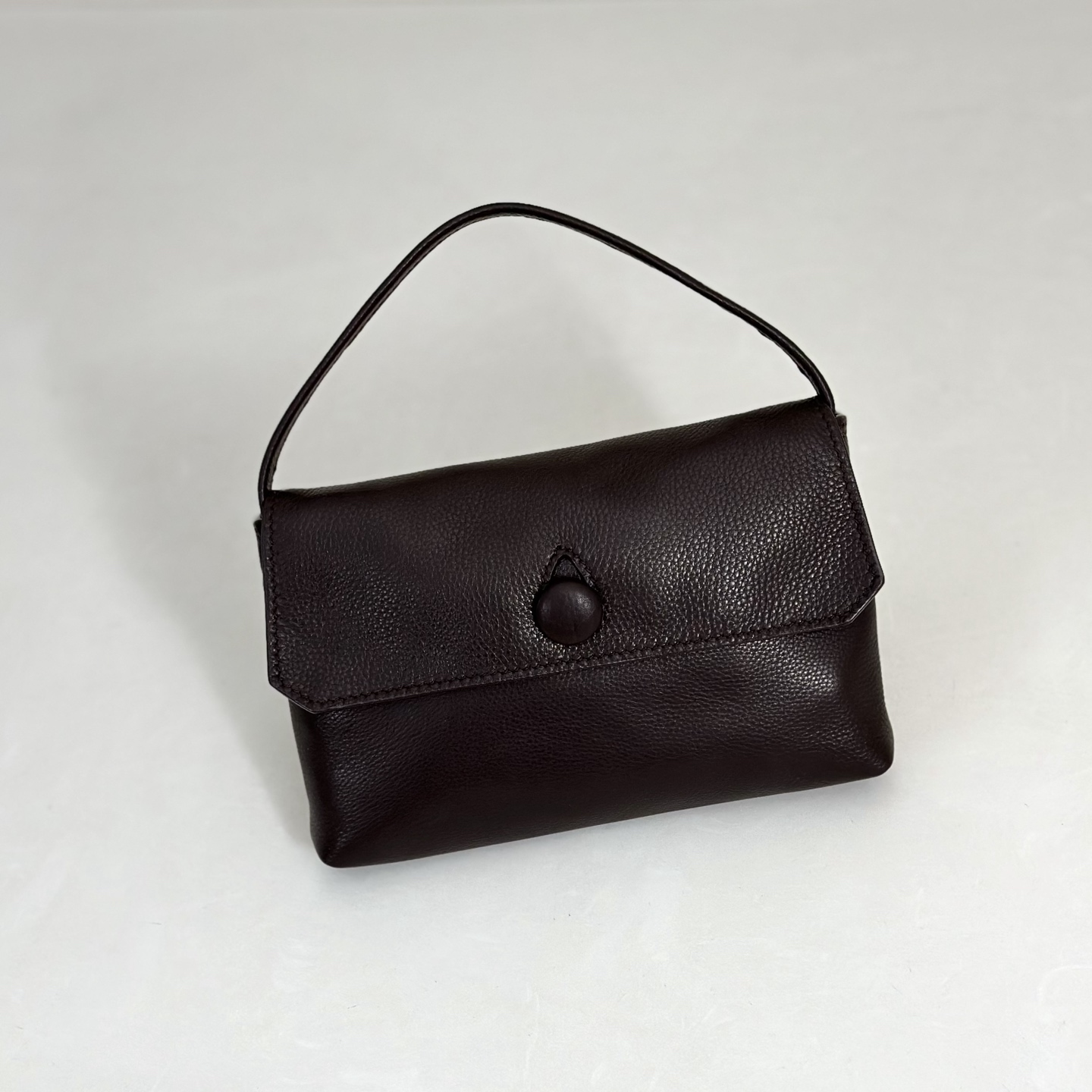 더 로우 샐리 백 레더 다크 브라운  18X11X3cm